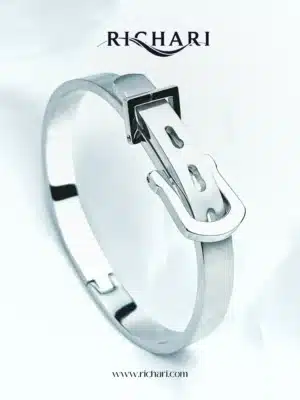 Buckle-Inspired Silver Bangle by Richari”